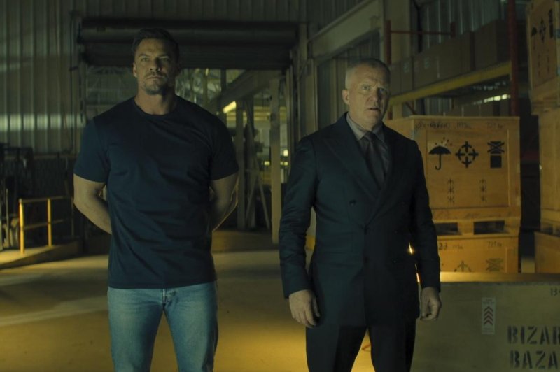 Alan Ritchson (L) and Anthony Michael Hall in a scene from "Reacher" Season 3. Hall this week signed on for a role in Netflix's "Wednesday." File Photo courtesy of Prime Video