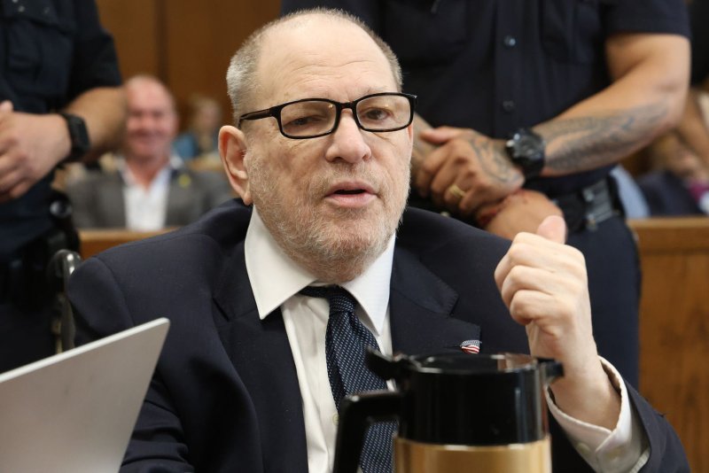 Former Hollywood producer Harvey Weinstein sits in the courtroom Friday during his criminal retrial in Manhattan, N.Y. He was convicted but an appeals court last year overturned the conviction due to the court allowing testimony of alleged sexual assault by Weinstein against a woman not among his accusers. Pool Photo by Jefferson Siegel/UPI