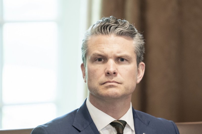 Secretary of Defense Pete Hegseth listens during a cabinet meeting held by President Donald Trump at the White House and issued a memo laying out a new blueprint for the U.S. Army on Wednesday. Photo by Ken Cedeno/UPI