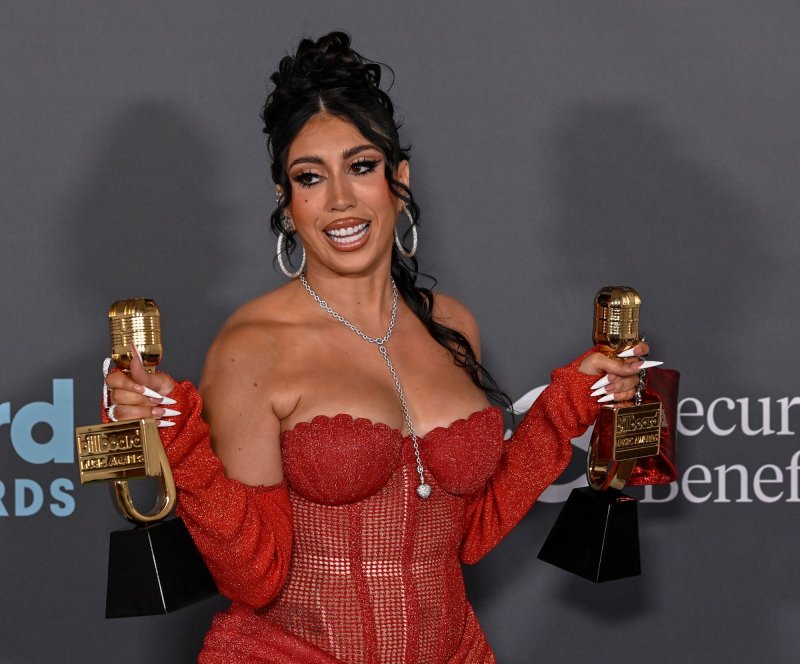 Kali Uchis appears backstage with her two awards during the annual Billboard Music Awards in 2022. She released "ILYSMIH" Friday. File Photo by Jim Ruymen/UPI