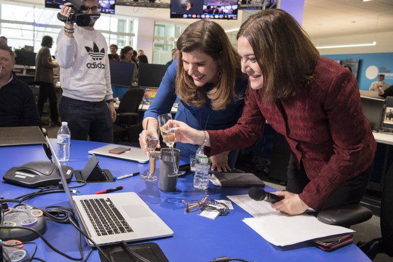 USA Today Editor in Chief Nicole Carroll, left, and USA Today Network President Maribel Perez Wadsworth celebrate with colleagues via Skype following the announcement of the 2018 Pulitzer Prizes. File Photo by Andrew P. Scott-USA Today