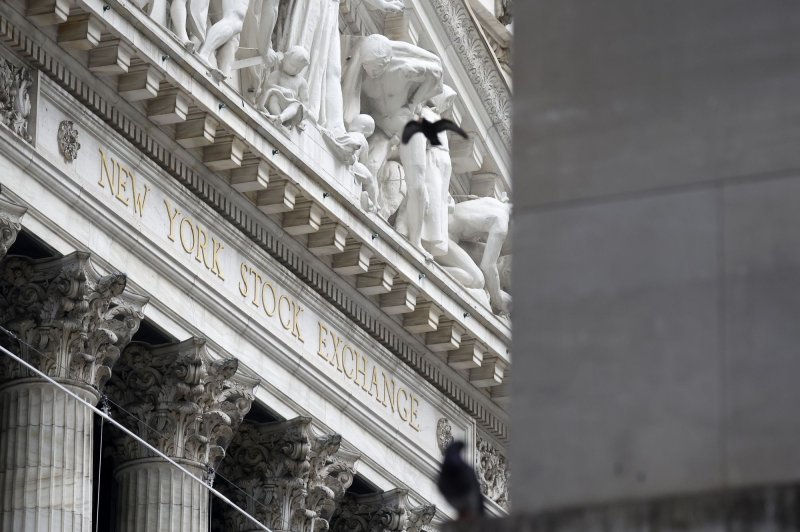 Members of SPHEREx, NASA’s Spectro-Photometer for the History of the Universe, Epoch of Reionization and Ices Explorer, visited the New York Stock Exchange to ring the closing bell. File Photo by John Angelillo/UPI