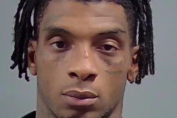 Police said they found Florida UFC fighter hiding in dog crate after alleged attack