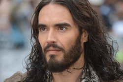Russell Brand out on bail after court appearance on rape, sexual assault charges