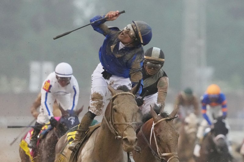 Sovereignty, ridden by Junior Alvarado, crosses the finish line to win the 151st running of the Kentucky Derby at Churchill Downs in Louisville, Ky., on Saturday, Journalism, ridden by Umberto Rispoli, placed second, and Baeza, ridden by Flavien Prat, finished third. Photo by Pat Benic/UPI