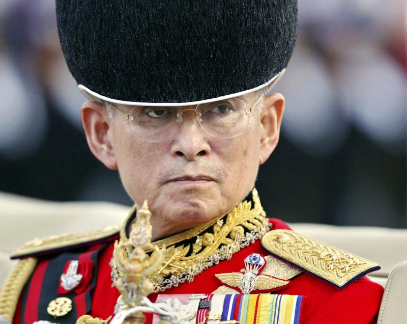 A file picture dated December 2, 2004, shows Thai King Bhumibol Adulyadej inspecting the royal parade of honor in Bangkok. A Royal Palace statement said that King Bhumibol, the world's longest-serving head of state and the longest-reigning monarch in Thai history, has died aged 88 in Siriraj hospital on October 13, 2016. Photo by Vinai Dithajohn/epa
