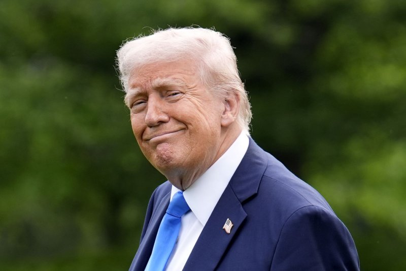 U.S. President Donald Trump walks on the South Lawn of the White House in Washington before his departure to Alabama on Thursday, the same day he signed an executive order to halt all federal funds to NPR and PBS. Photo by Yuri Gripas/UPI
